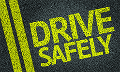 Drive Safely written on road